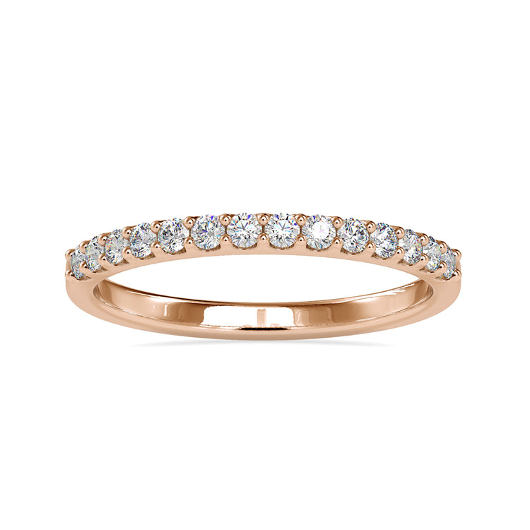 Brilliant cut round diamond half pave wedding band for a timeless look.