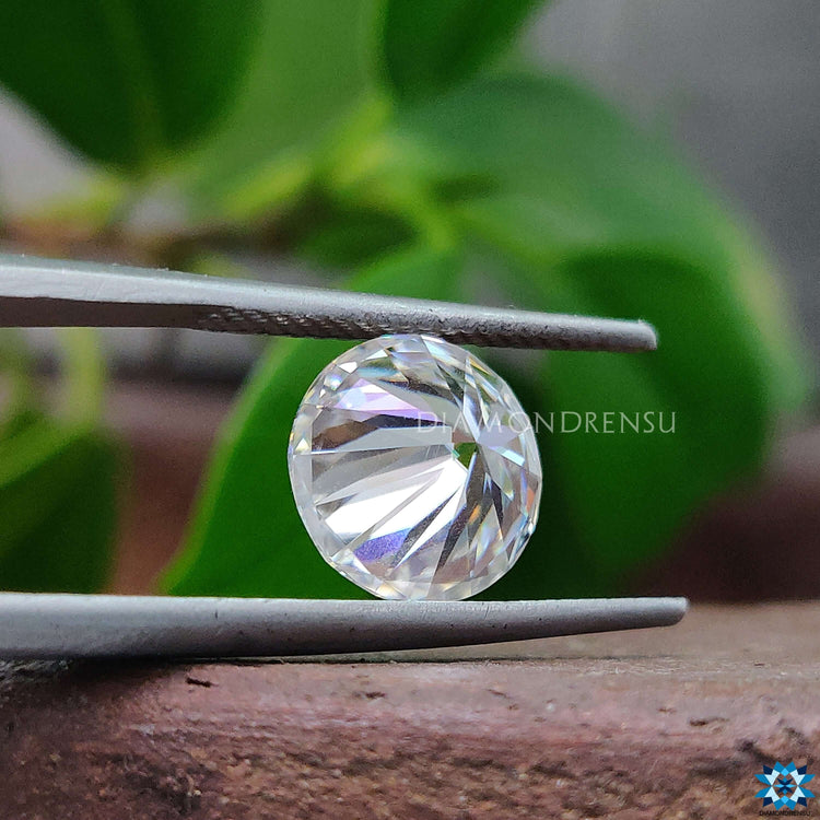 Round Heart and Arrows Cut Moissanite shown for rings or earrings.