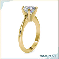 Round brilliant cut diamond in a solitaire engagement ring style