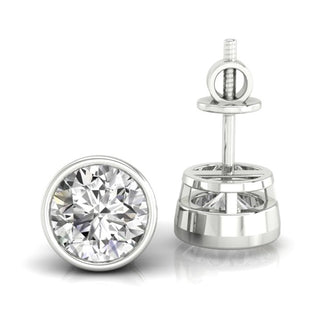 Elegant round diamond earrings with a bezel setting, perfect for a minimalist style.