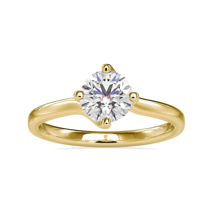 A Yellow gold ring with compass prongs and round diamond.