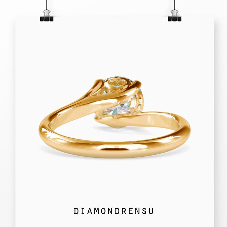 Diamond solitaire ring round in a classic bypass setting.