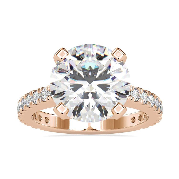 Engagement ring with pave accents and 2 carat round cut diamond ring.