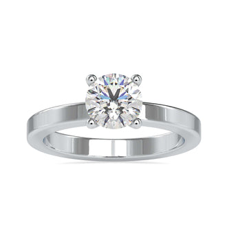 Romantic White gold solitaire ring with a round lab grown diamond in a basket setting.
