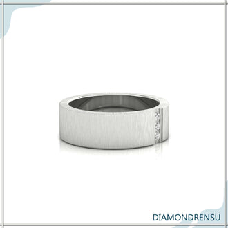 Antique wedding band with three stone setting in brushed finish gold.