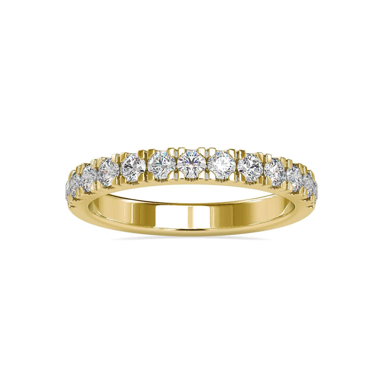 Gold wedding band for women featuring a half eternity diamond band design.