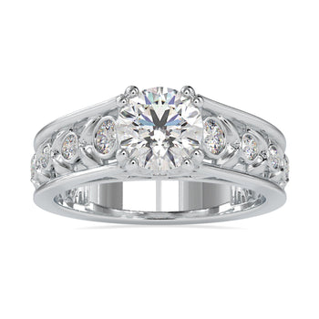 Nature inspired engagement rings featuring a round brilliant cut diamond.