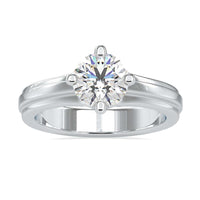Round solitaire ring featuring timeless elegance and radiant sparkle.