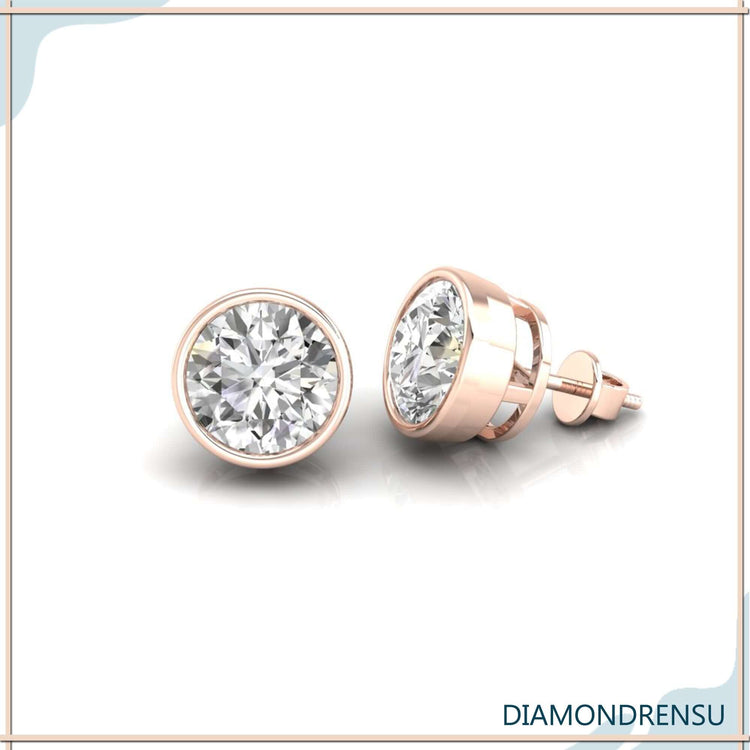Bezel diamond earrings with IGI certified diamonds, perfect for a modern and elegant style.