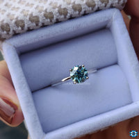 Exquisite moissanite solitaire engagement ring with a dazzling round cut, ideal for modern brides.