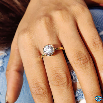 Sparkling round cut moissanite engagement ring for endless shine.