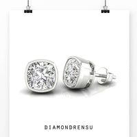 Dazzling cushion cut earrings diamond in a bezel setting, handmade for added elegance.