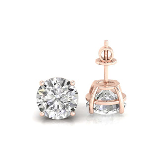 Beautiful gold stud earrings for women featuring a round design, ideal for everyday elegance.