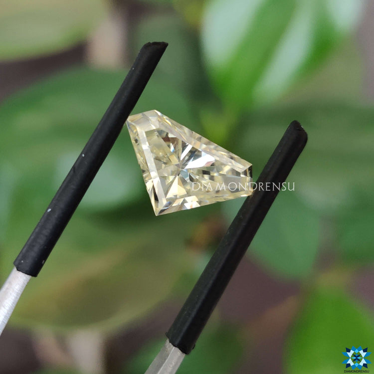 Off white moissanite glowing like antique cut moissanite.