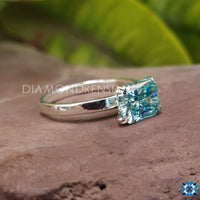 Elegant collection of blue moissanite rings for her.