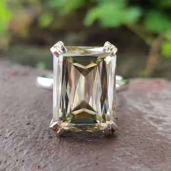 A stunning gold solitaire engagement ring featuring a timeless design and elegant craftsmanship.