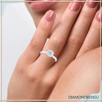 Beautiful twisted prong diamond ring with a unique solitaire design for added sparkle.