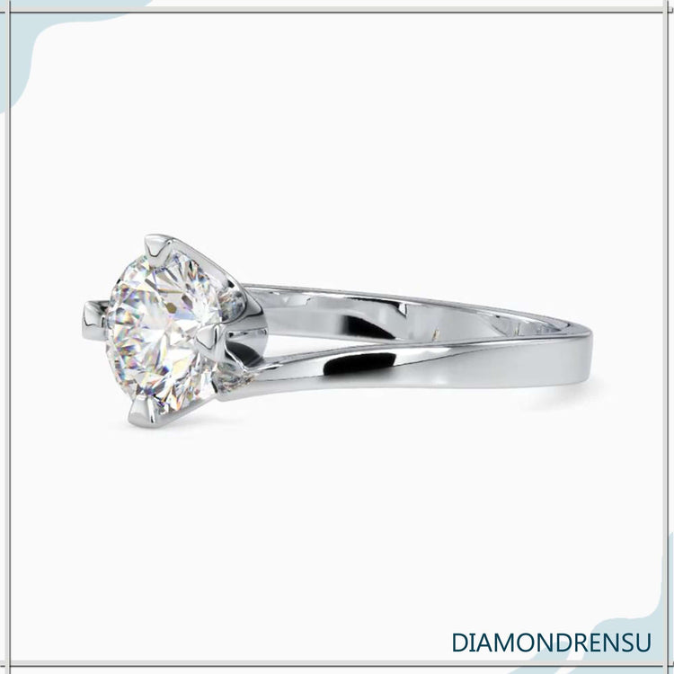 Diamond ring solitaire offering classic elegance and style.