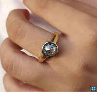 Rose cut bezel ring showcasing intricate craftsmanship.