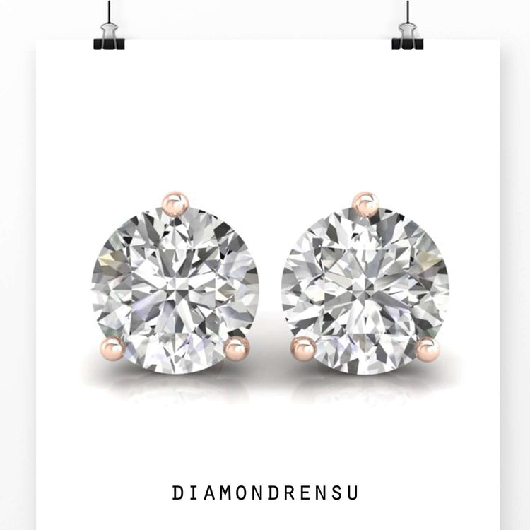 Elegant round gold earrings studs with a handmade finish, ideal for special occasions.