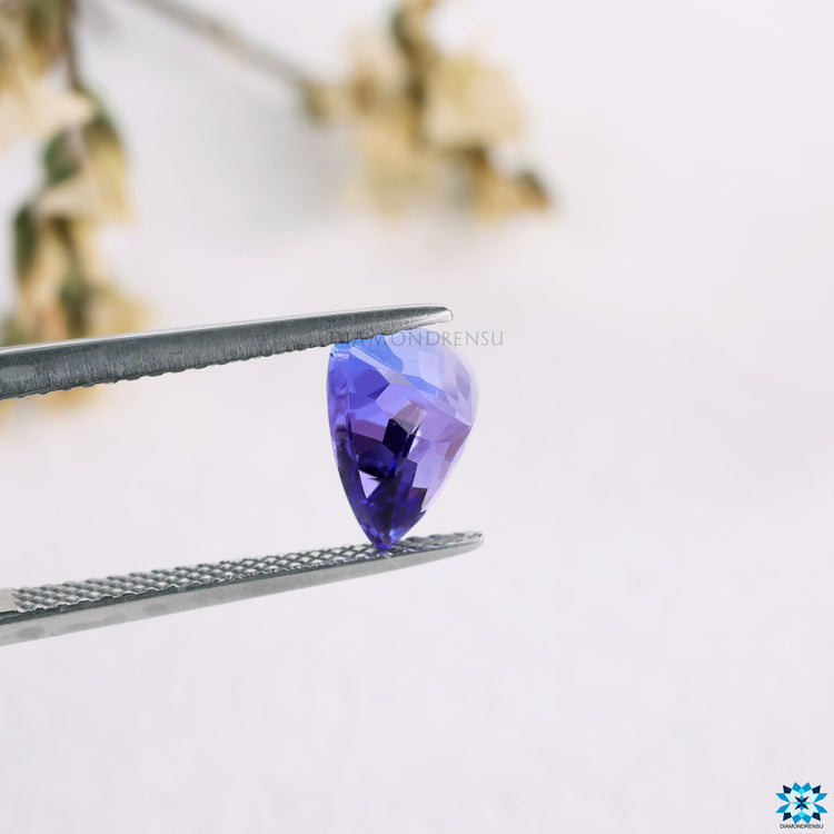 Loose tanzanite gemstone featured as 2.47 carat trillion gemstone and december gemstone.