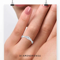 Three stone twist engagement ring with a rose gold twist ring band and diamond accents.