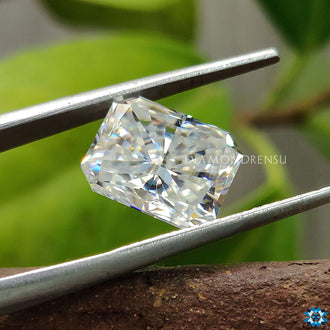 Moissanite Radiant Cut from Diamondrensu used in drop earrings with matching loose Moissanite stone.
