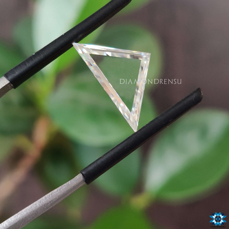 Triangle portrait cut moissanite used for center stones.