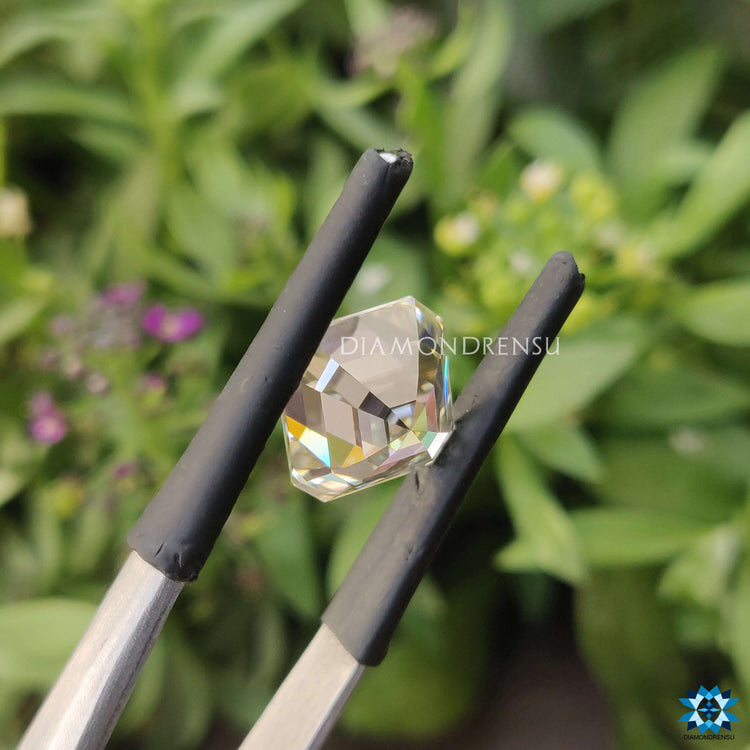 Off white asscher cut provided as a moissanite loose stone.