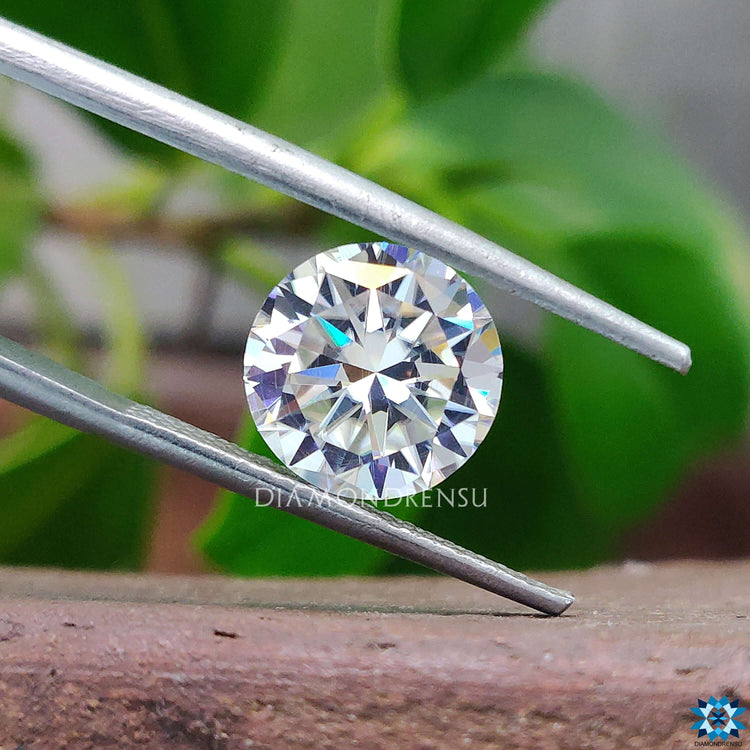 Moissanite Loose Stone shown in round heart and arrows shape.