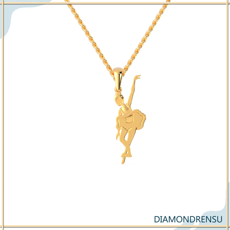 Dancer pendant necklace in gold, featuring a ballet-inspired design