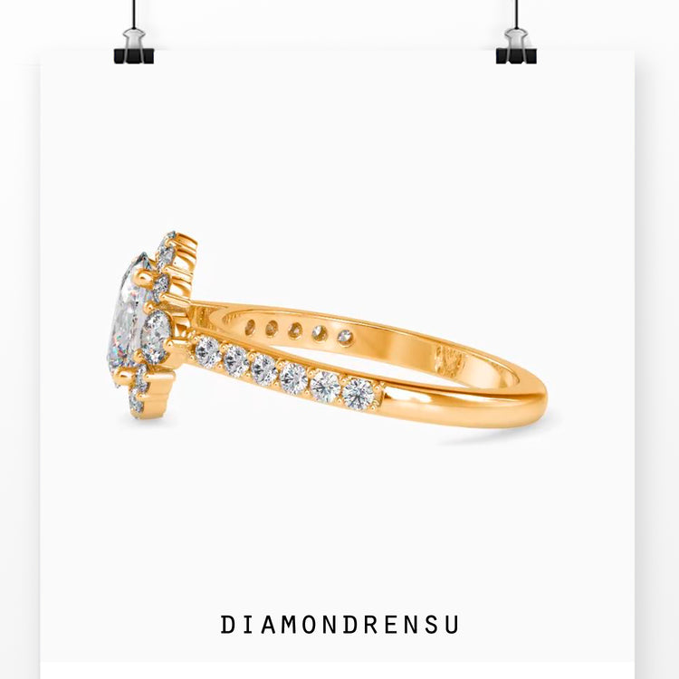 Three stone diamond ring with oval cut center and pave accents