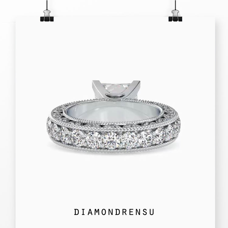 Handmade jewelry featuring a princess cut ring in rose gold.