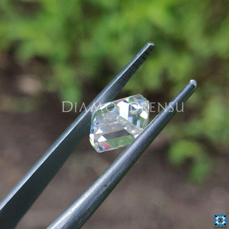 Emerald cut moissanite loose stone paired with loose emerald cut moissanite.