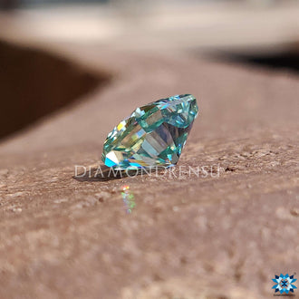 Loose moissanite stone in 1.85 carat radiant cut and vivid blue color.