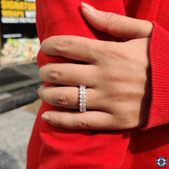 Elegant eternity band oval, arranged perfectly to reflect a continuous circle of love.