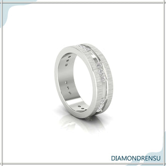 Yellow gold men's wedding band with polished shine.