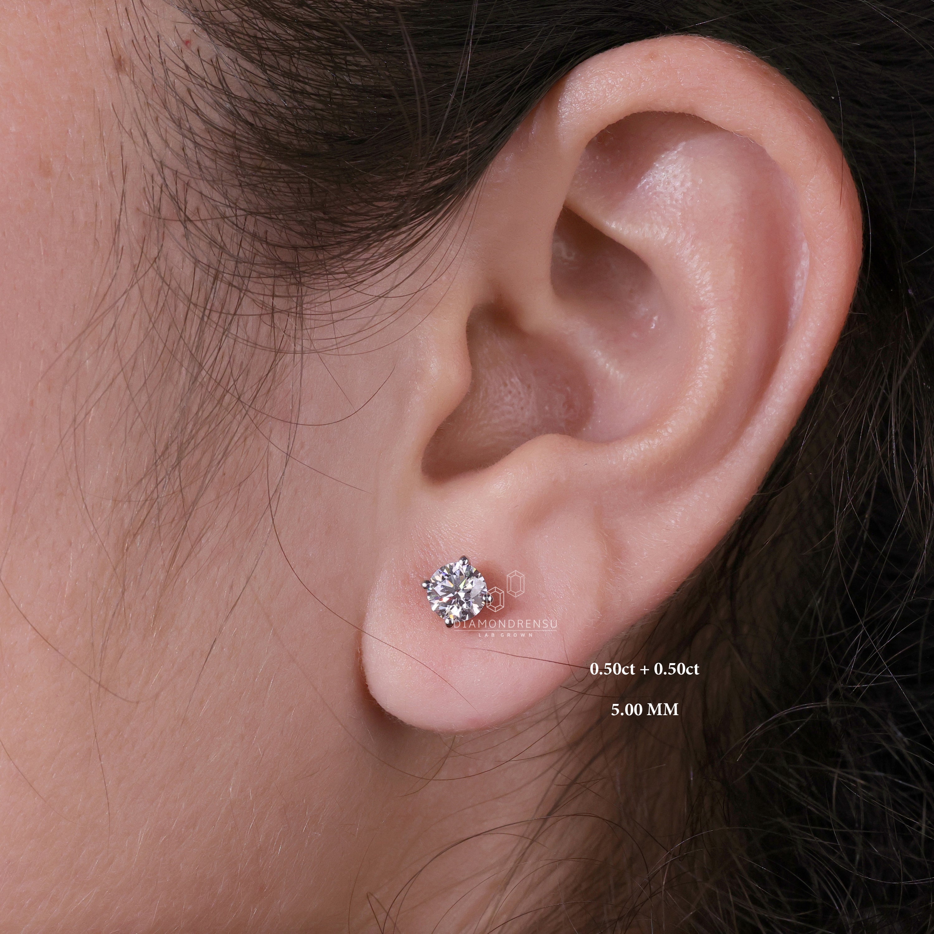 Model wearing lab grown diamond studs, showcasing their brilliant sparkle and sustainable design.
