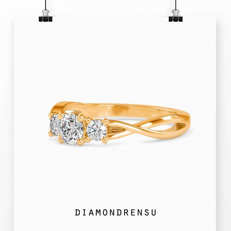 Three ring diamond ring with a twisted diamond band and IGI certified stones for added brilliance.