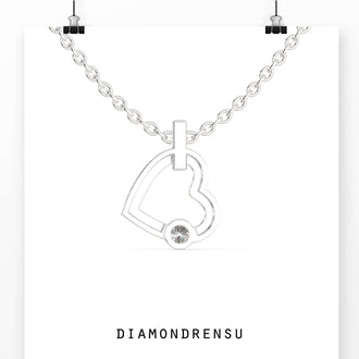 A tension setting pendant showcases a unique, secure design.