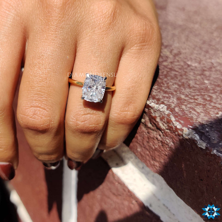 Cushion cut solitaire ring handcrafted for special moments.