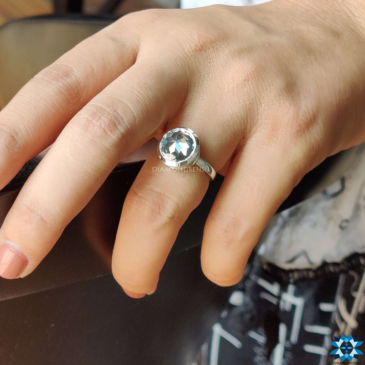 Rose cut moissanite ring featuring a delicate bezel setting, adding a vintage touch to any outfit.