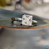 A close-up of an engagement ring princess cut highlighting its brilliant facets.