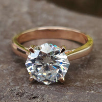Octagon engagement ring in a stunning rose gold setting for a modern look.