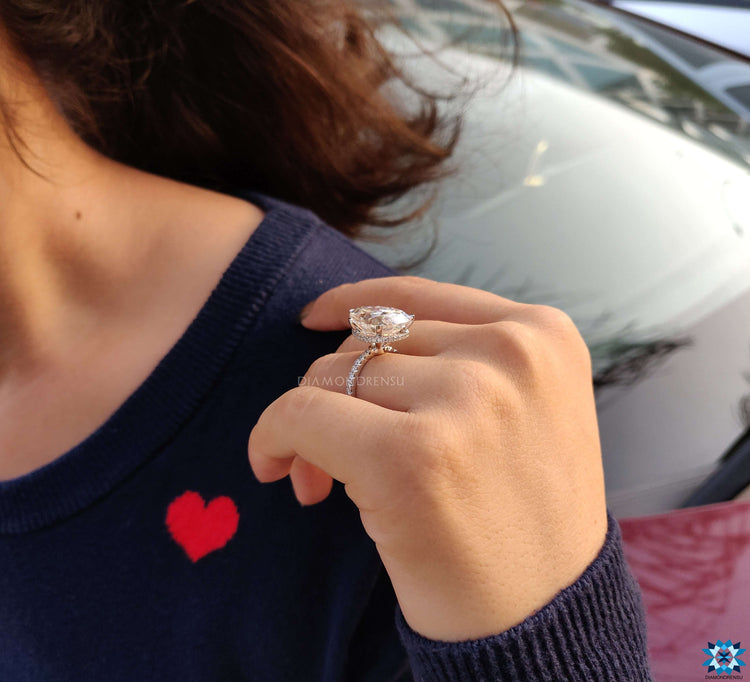 Radiant hidden halo engagement ring with intricate details.