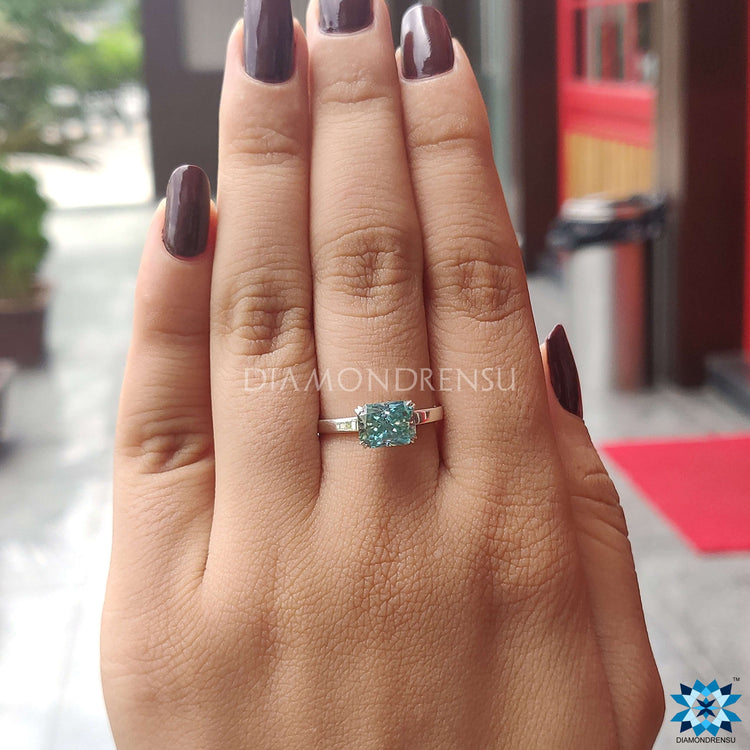 Moissanite east west ring for a modern touch.