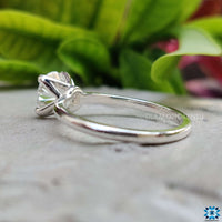 4 prong solitaire engagement ring with a sleek design