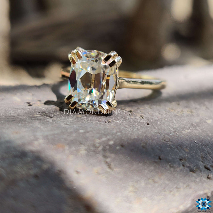 Sophisticated cushion engagement ring with a handcrafted touch.
