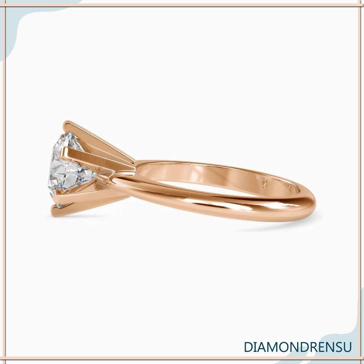 Round cut diamond ring in a 6 prong setting, perfect for engagements