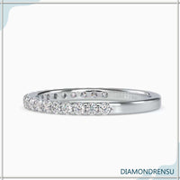 Round wedding band featuring pave diamond band, handmade jewelry